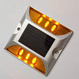 Solar cast aluminum reflective surface cross channel nail light